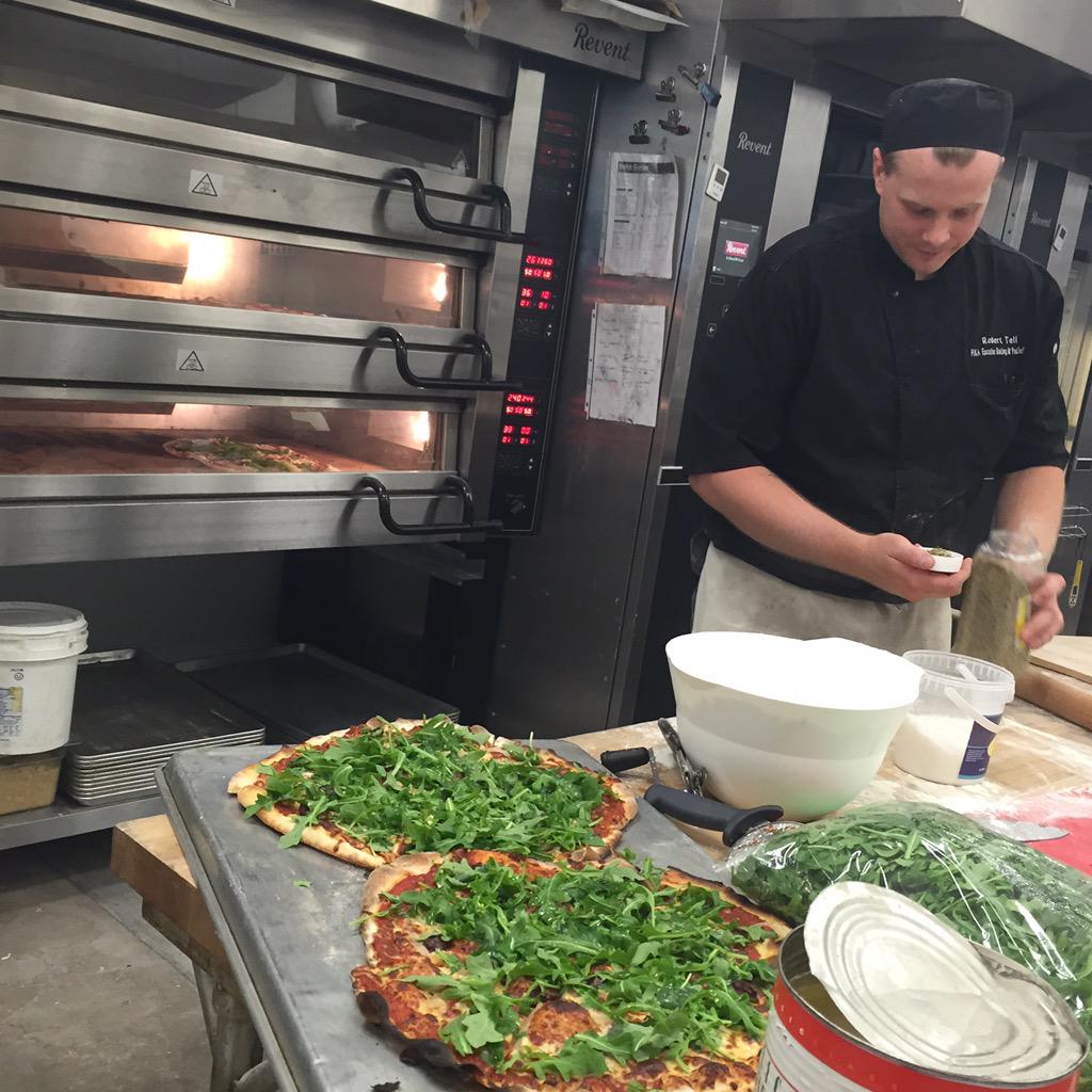 Our #fikanyc Executive Pastry/Baker <a href="/roberttell/">roberttell</a> hard at work making the staff #pizza! Thank you for the #surprise!