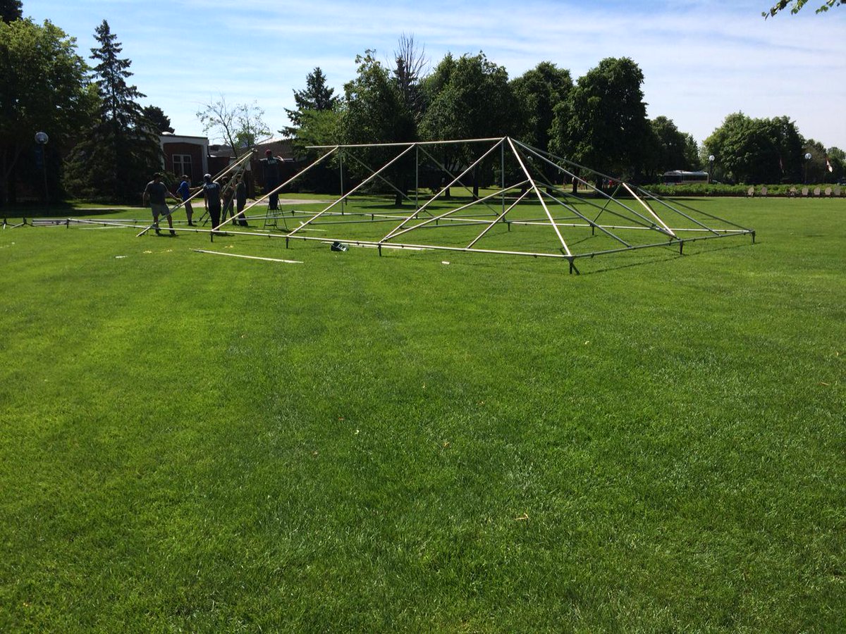 SaintBensAlums's tweet photo. Wait, there's monkey bars?! Oh, this Reunion's going to be AWESOME. #csbsjureunion #ohneverminditsatent http://t.co/kNNEgFkCm6