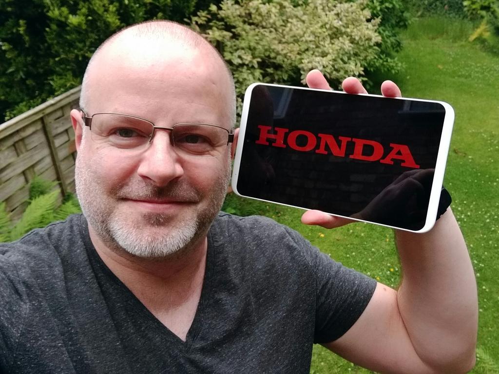 adrianjdalby's tweet photo. @Honda_UK #HondaFOS Here's me with with my brand new tablet... old one died suddenly. Pity Honda don't make tablets! http://t.co/kzCPF7IDOp