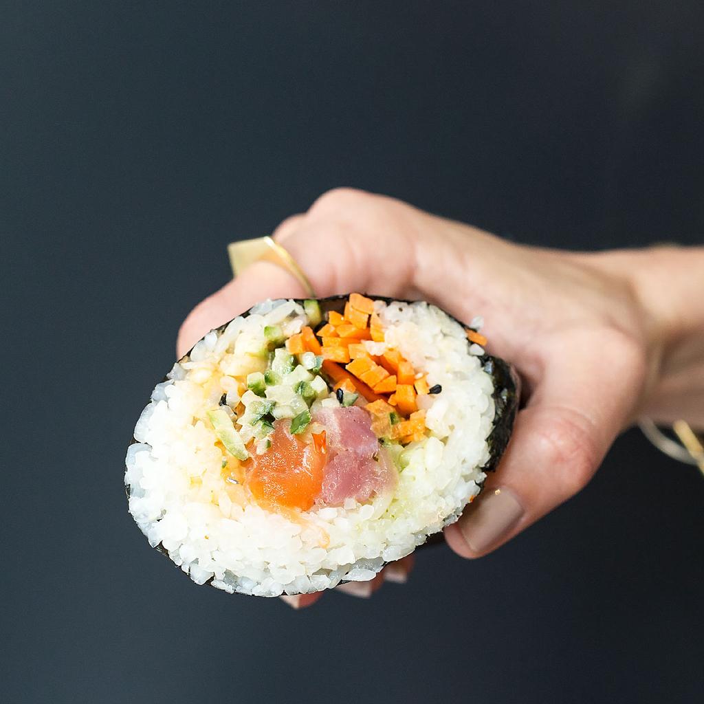 foodandwine's tweet photo. The sushi burrito is a food mash-up that just makes sense. http://t.co/PZXkwwwgLf #FWx http://t.co/mboXIPrbwC