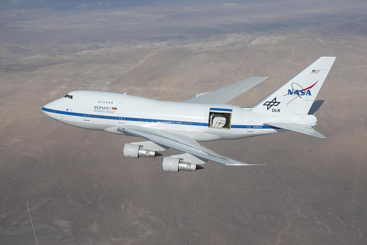 newscientist's tweet photo. So... we hitched a ride on a converted 747 to chase Pluto's shadow across the Earth http://t.co/jzJQXlohj6 http://t.co/Qg2gB0U1m7