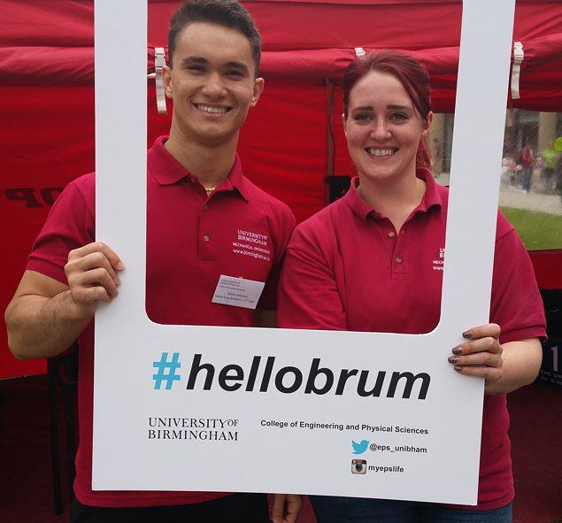 unibirmingham's tweet photo. Saying #hellobrum with our #ubracing student ambassadors. Visit the F1 simulation car outside the Aston Webb building http://t.co/6v0AgOZZZn