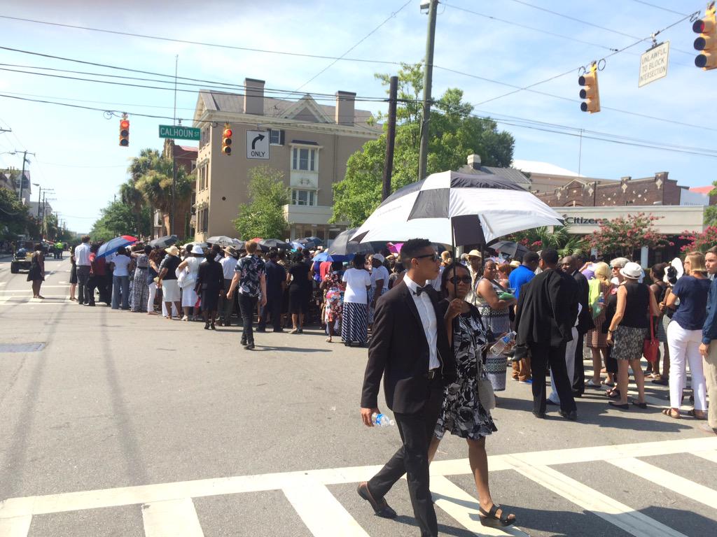 Edpilkington's tweet photo. I now live in a nation that accepts gay marriage but here I am @ funeral of victim of a white supremacist #USdivided http://t.co/PM05kuh3n8