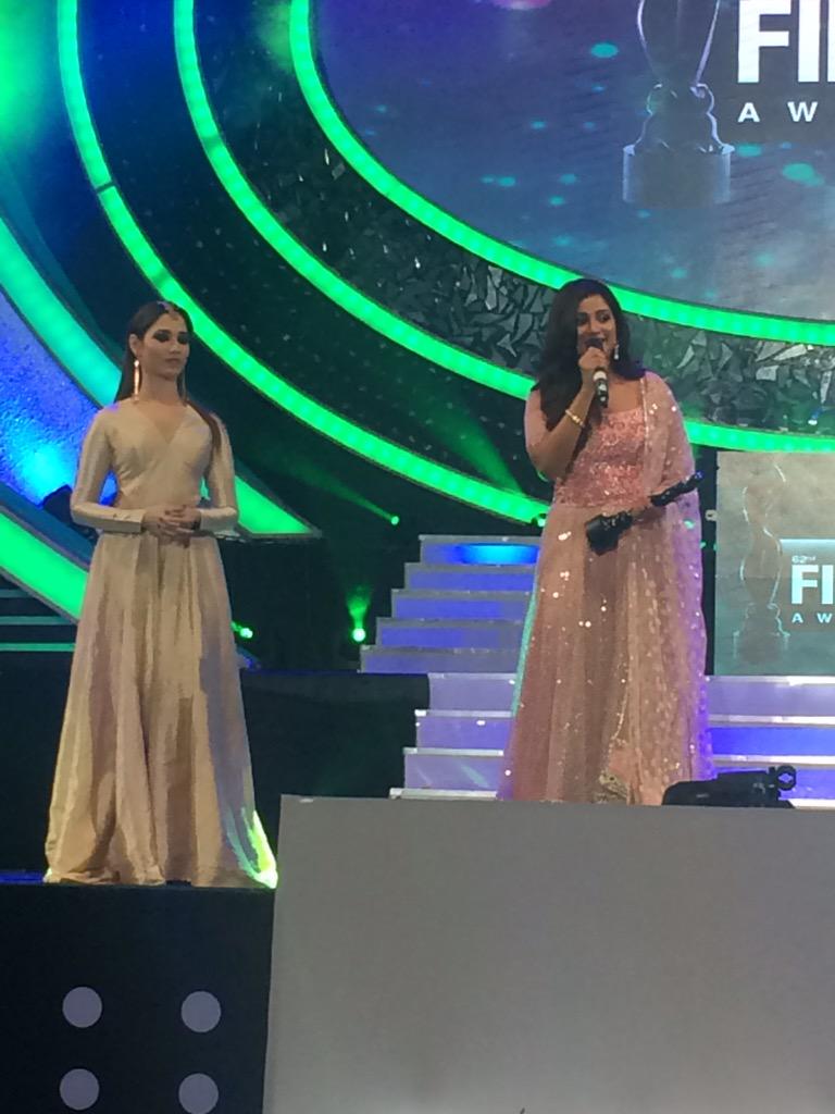 filmfare's tweet photo. The elegant @tamannaahspeaks presents the award to @shreyaghoshal. #BritanniaFilmfareAwards South. http://t.co/NM11aQdM8C