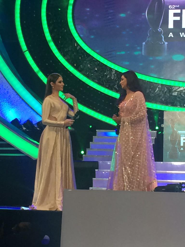 filmfare's tweet photo. The elegant @tamannaahspeaks presents the award to @shreyaghoshal. #BritanniaFilmfareAwards South. http://t.co/NM11aQdM8C