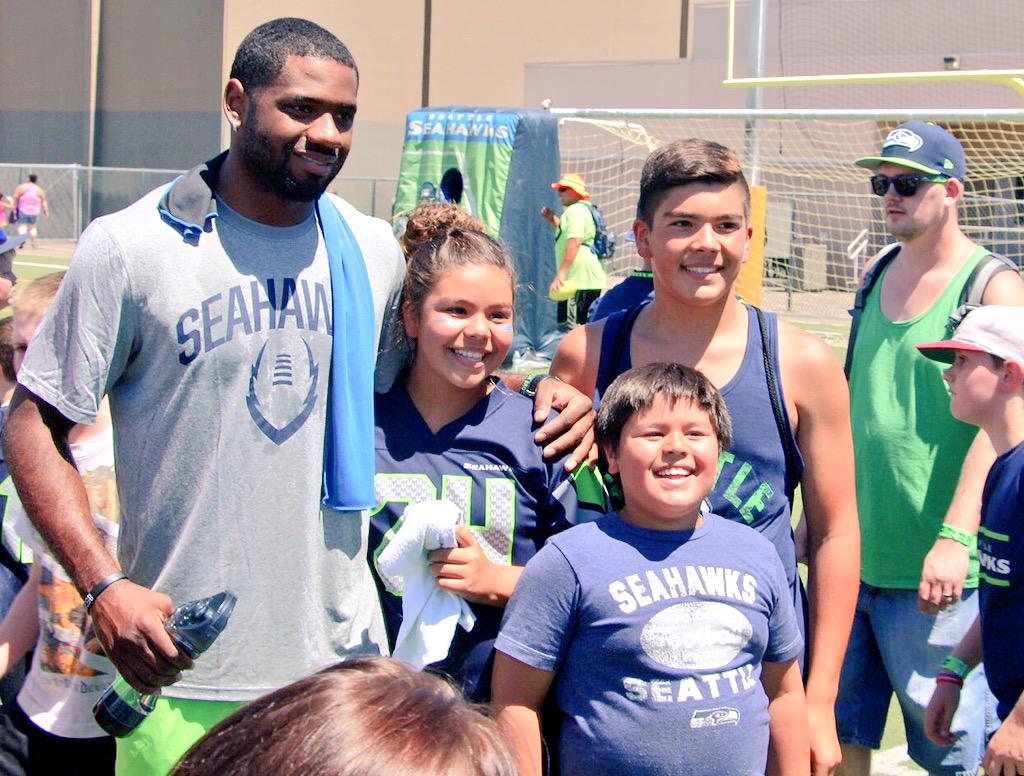 Seahawks's tweet photo. 12 Fest Tri-Cities!

@jstaten90 @TheRealCMaTT13 &amp; @BlitzTheSeahawk having a blast out here in the heat! 🔥

#12Tour http://t.co/W8eVQLq4vA