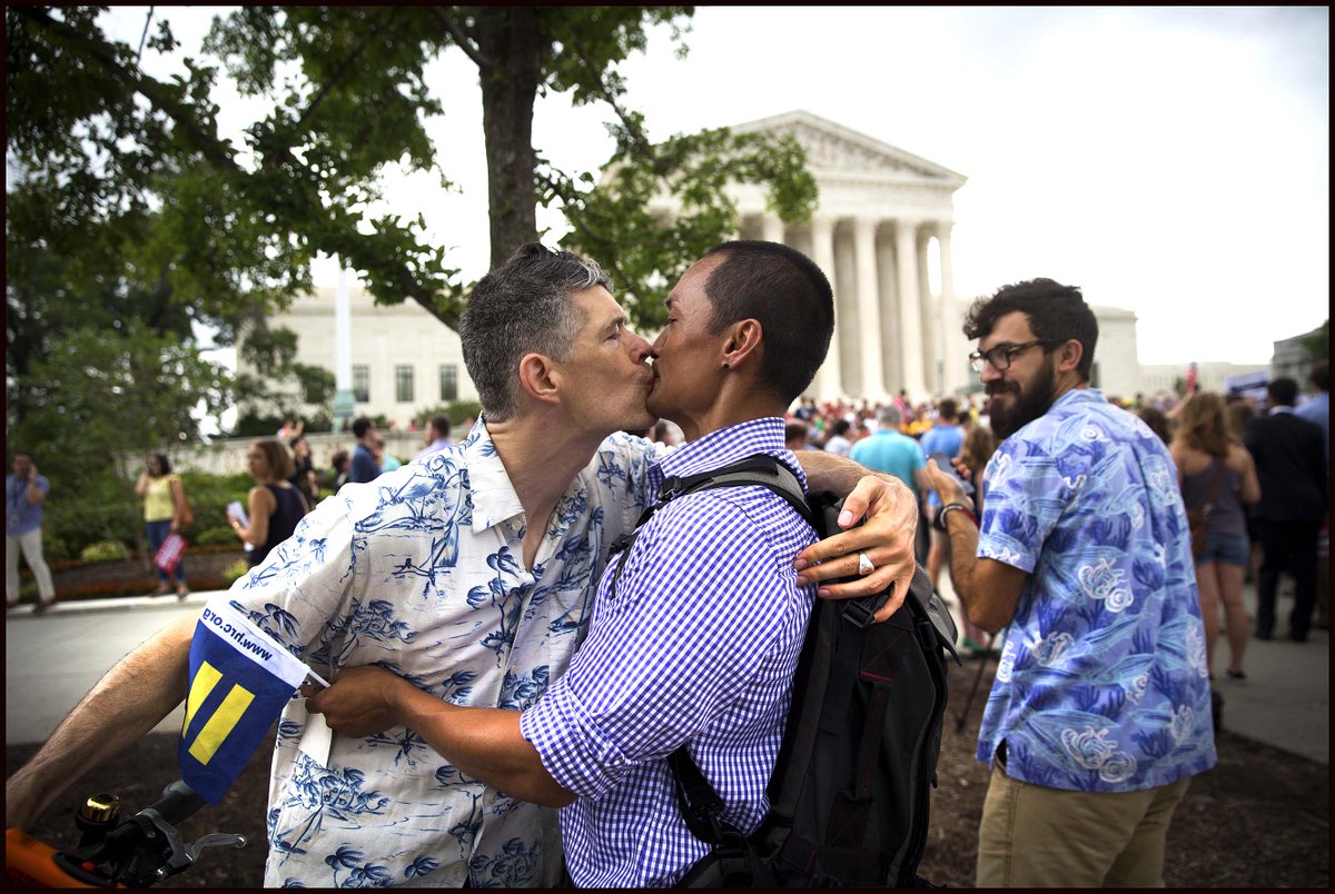 dougmillsnyt's tweet photo. Christian Crowley kisses his husband Alejo Jumat after the Supreme Court ruled 5-4 in favor same-sex marriage. http://t.co/vQ4S6y95Wf
