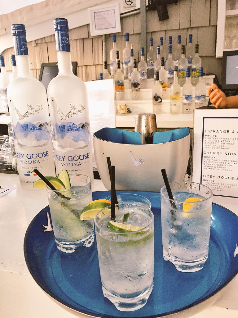 HamptonsMag's tweet photo. Toasting cover star @chaneliman with refreshing summer sips by @GreyGoose at @BeautiqueDining #HamptonsMagEvents http://t.co/kEv7kvwldL