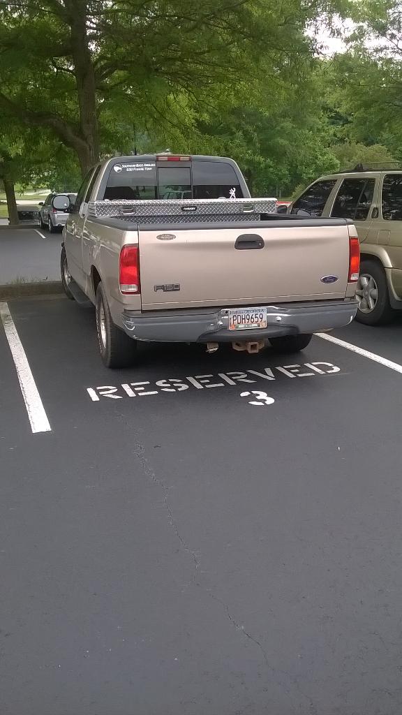 JoeBates21's tweet photo. Yea they decided to give me my own parking spot #3 #ExecutiveIntern http://t.co/6a9Zu0inMg