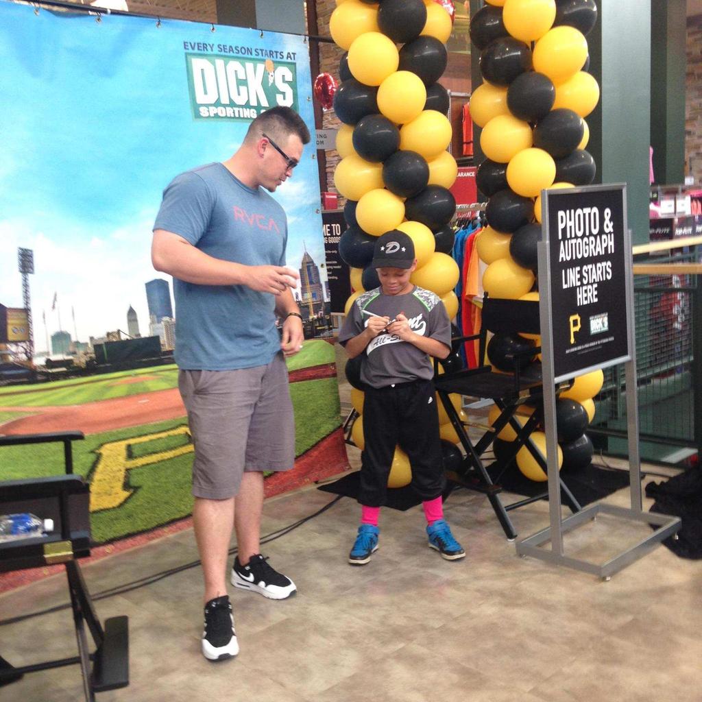 Tulio Watts signs one of HIS cards for <a href="/VANIMAL_46/">Vance Worley</a> yesterday at <a href="/DICKS/">DICK'S Sporting Goods</a>. Vance is a big Tulio fan. #priceless