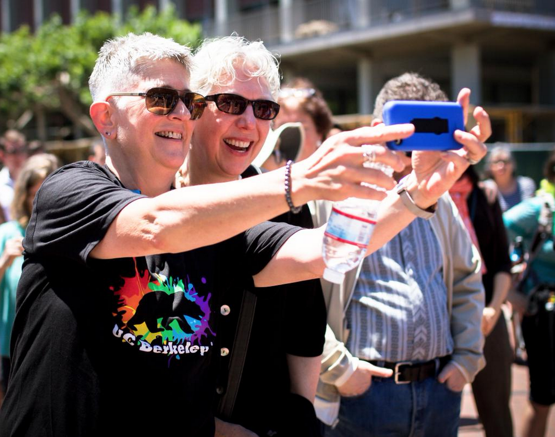 UCBerkeley's tweet photo. With hugs, tears &amp; selfies, campus celebrates #samesexmarriage ruling http://t.co/S7ZhVWMUah #LoveWins http://t.co/eF1USPKuv6