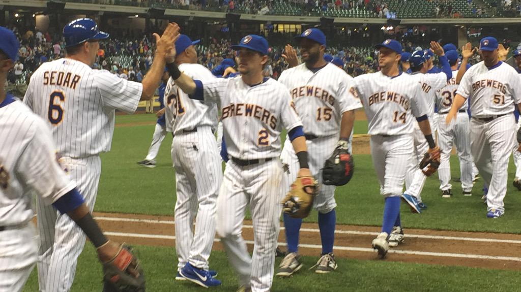 Brewers's tweet photo. High five! That's a big 10-4! See you back here tomorrow at 1:10pm CT for game 2 of #MILvsMIN. #Brewers http://t.co/T96T7sEdz7