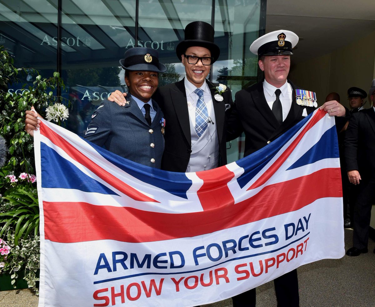 .<a href="/theRealGokWan/">Gok Wan MBE 🌈</a> poses with our flag for Armed Forces Day. Will you send a selfie to #SaluteOurForces?