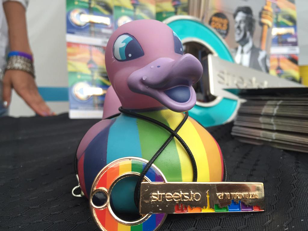 TorontoCityKey's tweet photo. Come get your #ProudGold #KeyToTheCityTO and the #GlowInTheDuck #ProudToBeDuck at #one11imports booth at #PrideTO! http://t.co/w7fITzEgNG