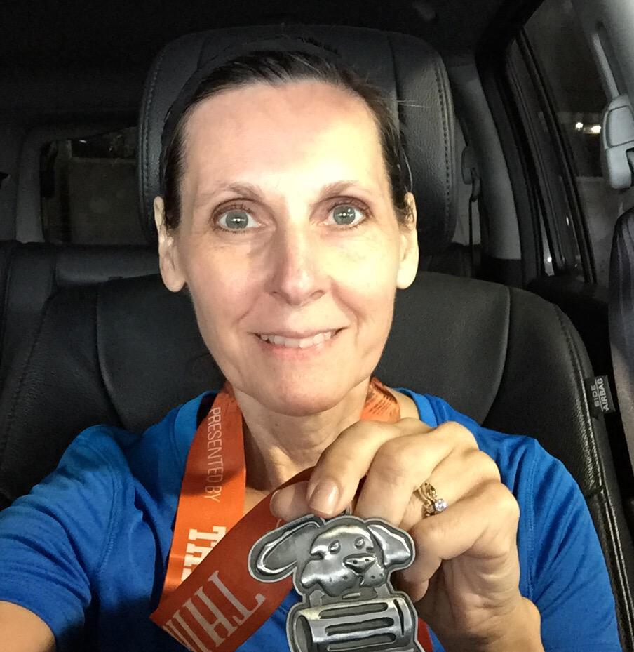 CindyPritt's tweet photo. I finished the Akron Thirsty Dog 8k better  than I thought. Yucky weather. Time 51:34, Pace 10:22. #runakron http://t.co/Jfy9DUU353