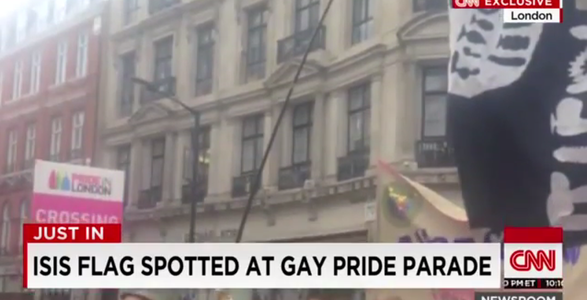 HuffPostUK's tweet photo. CNN mistakes flag covered in dildos for ISIS banner at London Pride http://t.co/nUMfpuDKxO #PrideinLondon #CNN #ISIS http://t.co/oXQq1K7w6v