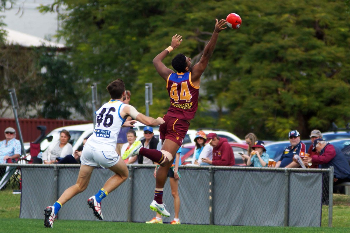 Big Arch. @brisbanelions @ArchieSmith_ in action against @GoldCoastSUNS in the @neaflofficial match at Coorparoo.