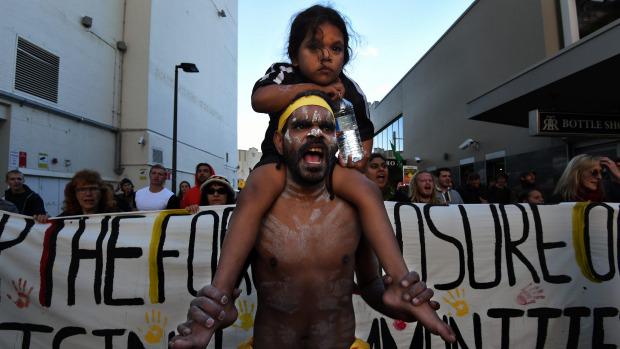smh's tweet photo. Protest against forced closure of Aboriginal communities shuts down George Street. http://t.co/vRhRlJ1MR6 http://t.co/UB7Q5OwQ9w
