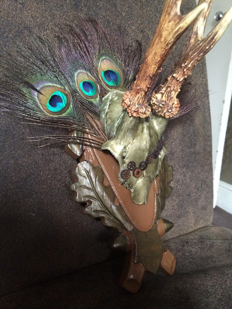 bone_creative's tweet image. Mounted roe deer skull with peacock feather plume and cog detail.  Comes with bone creative certificate . £40.