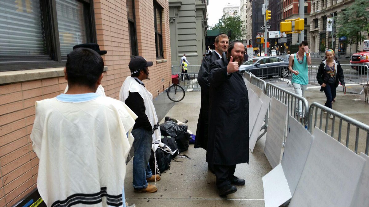 Flower_Bubble's tweet photo. @villagevoice @NYCPride #NYCPride Migrant workers pose as #Hasidim props for Anti-Equality protest. 5th Ave &amp; 16th. http://t.co/7XA81AImYW