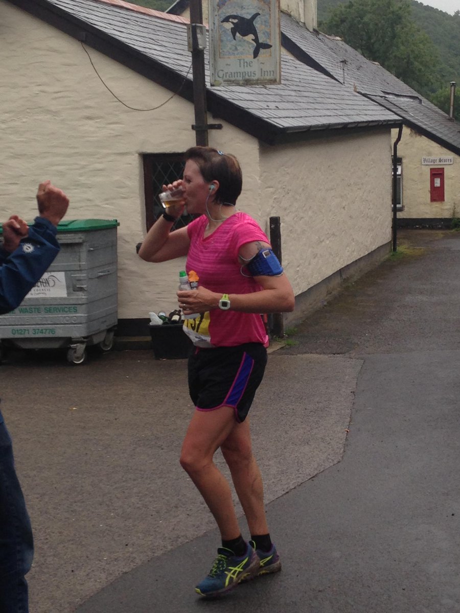 GavinAiles's tweet photo. Congrats to Andrew &amp; Mary. Here's Mary and a beer, mile 18, at the Grampus Inn. What a Legend #northdevonmarathon http://t.co/h2KgEIcXDR