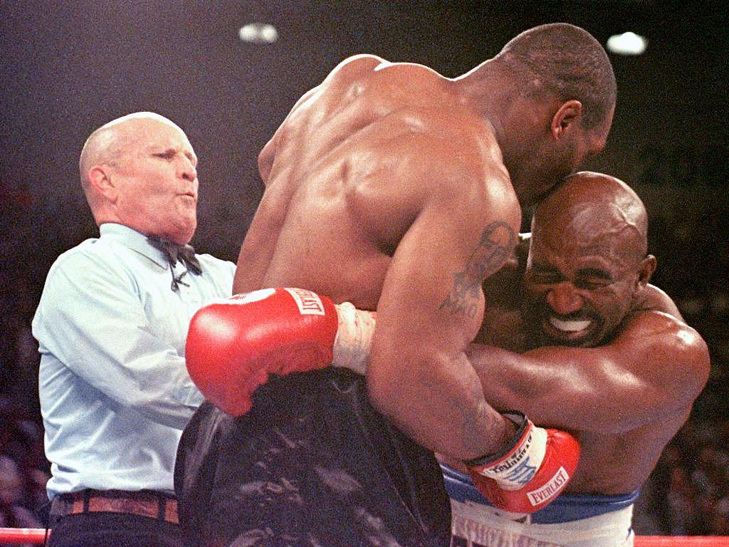 SportsCenter's tweet photo. On this date in 1997, Mike Tyson bit off part of Evander Holyfield's ear in WBA heavyweight championship 3rd round. http://t.co/o1CWdlu6Dt