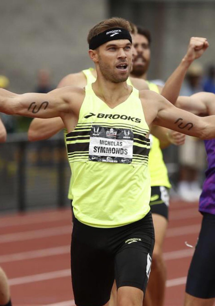 darrenrovell's tweet image. Temporary tattoo king @nicksymmonds wins 800m today wearing logos of his @rungum brand