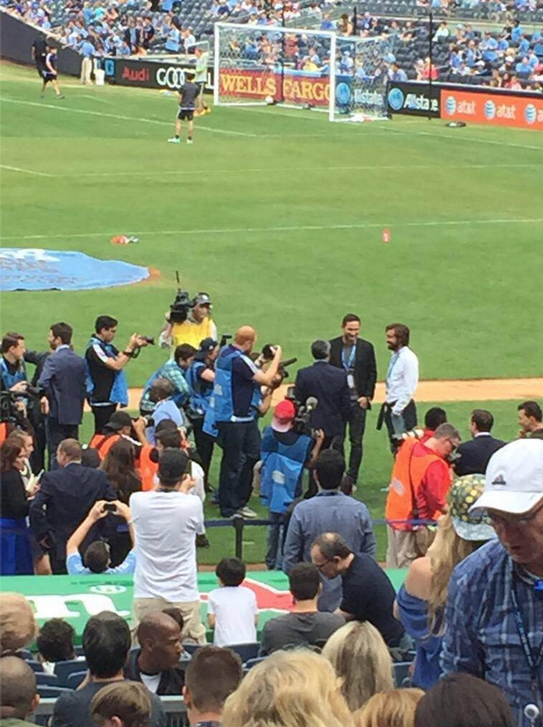 Lamps and Pirlo on the pitch during half time.