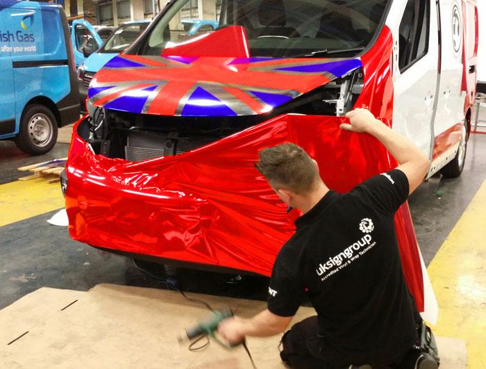 RobertLambie's tweet photo. Red Chrome Vehicle Wrap #uksignboards did for GM - General Motors for the Commercial Vehicle Show in Birmingham NEC http://t.co/utRM5YD3EX