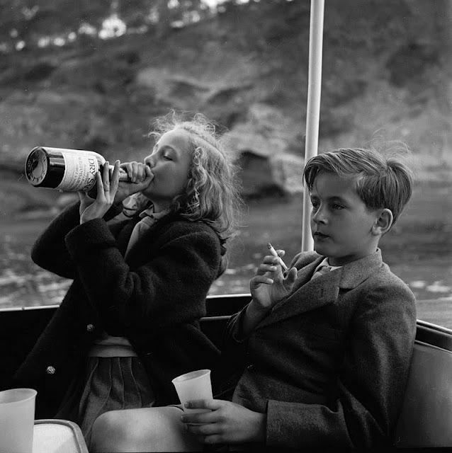 History Photographed (@historyinpics) on Twitter photo <a href="/HistoryInPics/">History Photographed</a> Princess Yvonne chugs straight from a liquor bottle, while 12 year old Prince Alexander smokes. <a href="/HistoryInPics/">History Photographed</a> Princess Yvonne chugs straight from a liquor bottle, while 12 year old Prince Alexander smokes.