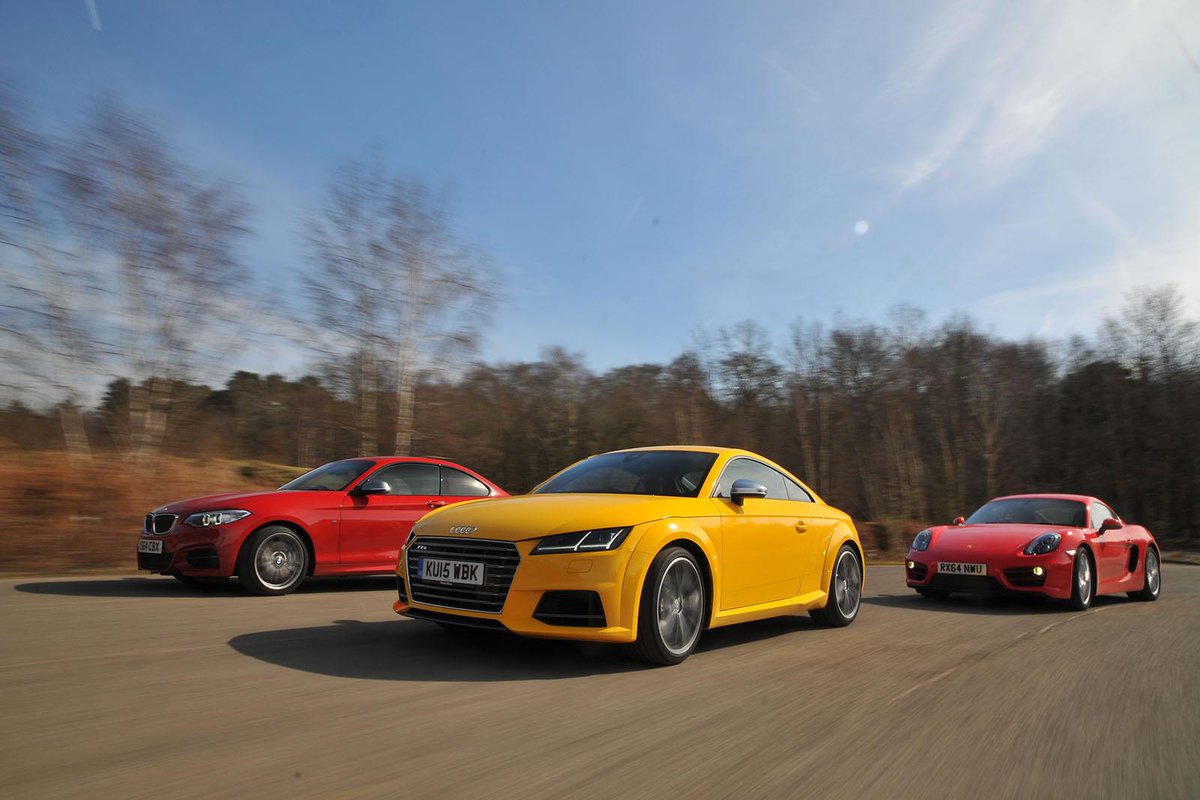 whatcar's tweet image. The sleek Porsche Cayman rules the sports car class. Can the Audi TTS or BMW M235i topple it? bit.ly/1LDAObO