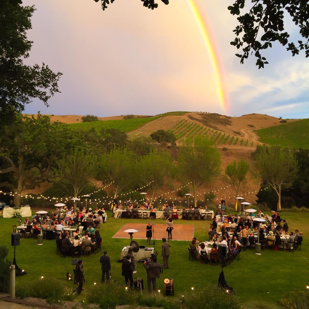 SolvangWineTour's tweet photo. Perfect #wedding under a double #rainbow @DemetriaEstate #winery #transportation #losolivos http://t.co/5SLA6oMJJZ