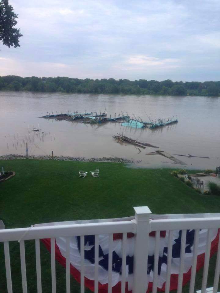 The docks from Indian Hill Boat Club in Maumee were floating down the river today. High water knocked them loose.