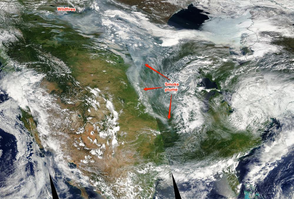 DiscoverMag's tweet photo. Smoke from Canadian wildfires is drifting south across much of the central U.S.: http://t.co/qPlip3Rm2g http://t.co/I3xapWVFuP
