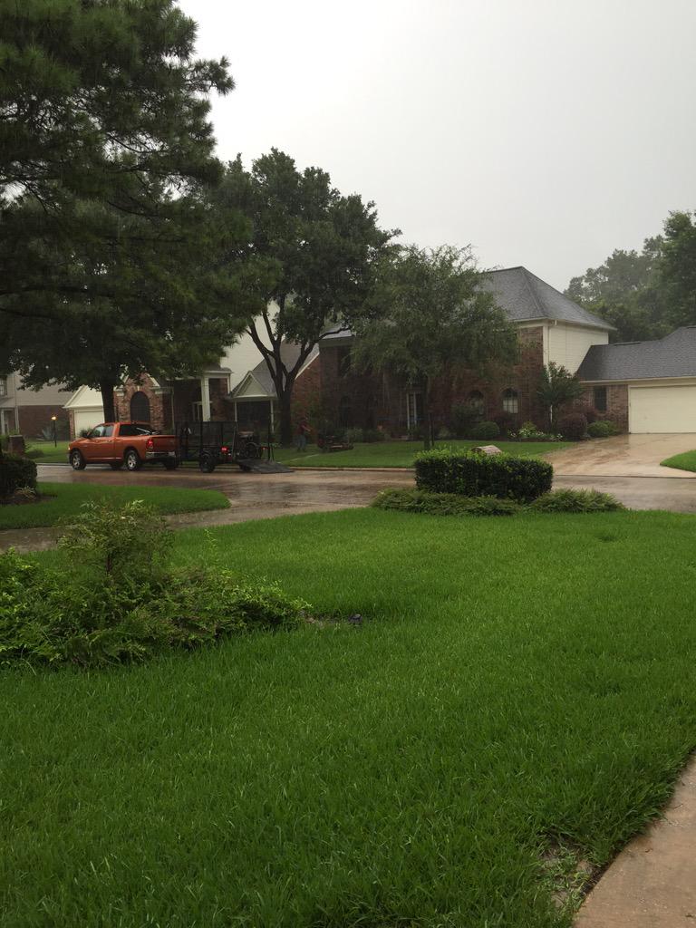 This takes stupidity to a whole new level! 2 inches of rain came down and this IDIOT is mowing my neighbor's lawn!