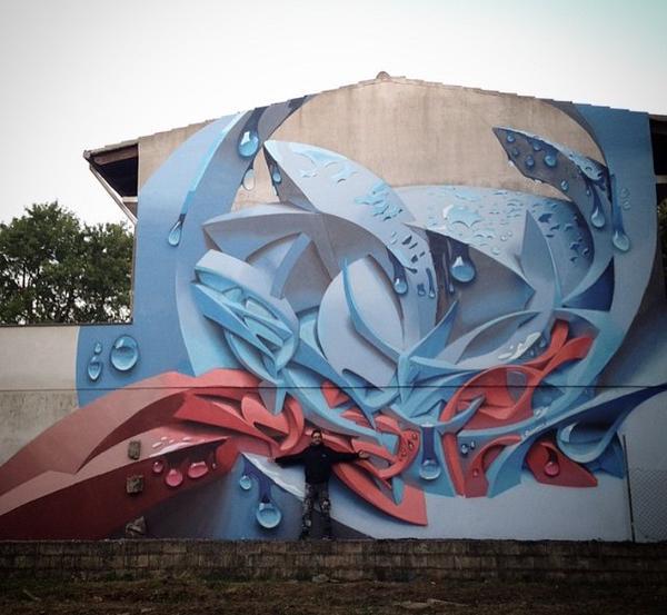 El artista Peeta_ead junto a su más reciente #StreetArt.
