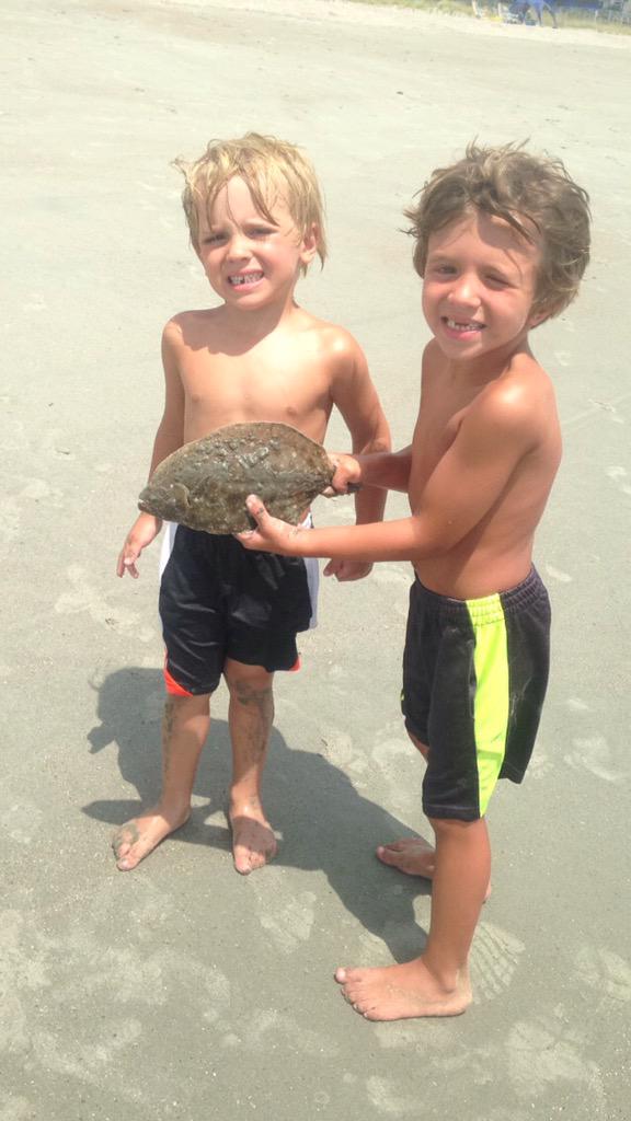 RedDevilSkipper's tweet photo. Caught a flounder in the surf today #13inches #HadToThrowBack #DidntWantUncleEricToFineUs http://t.co/P1cfPCX8kw