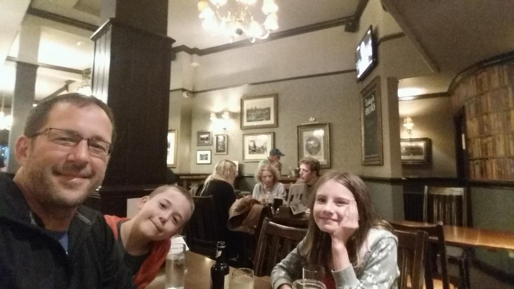 JodyCraniac's tweet photo. Eating at a British pub. Charlotte - bangers and mash, Max - steak and chips, dad - fish and chips! http://t.co/WqmJcCRGOH