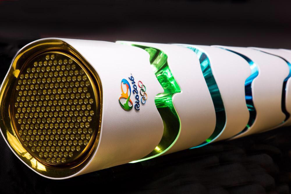 NBCOlympics's tweet photo. Look at these intricate details of the #Rio2016Torch! (via @Rio2016_en) http://t.co/QaSvDcPYtS