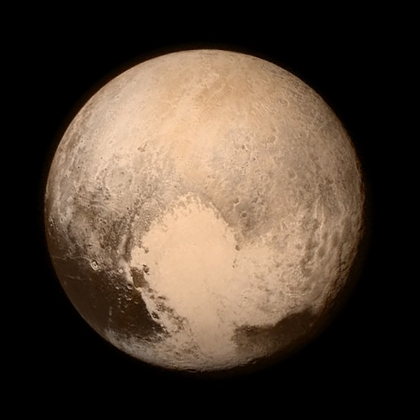 IvanSemeniuk's tweet photo. Holy Cow! Latest colour image of Pluto showing heart-shaped white patch. http://t.co/NHqsyQ9sqI