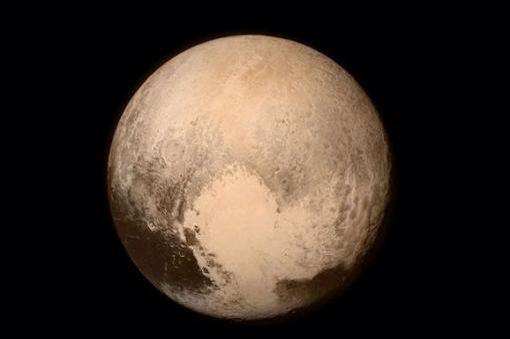 RaulGomez82's tweet photo. El corazón de Plutón me parece gloria bendita cósmica! #Plutón http://t.co/6eWkPLyudN