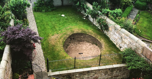 GolfDigest's tweet photo. What's better than a replica of the Road Hole Bunker in your backyard? Nothing, really: http://t.co/PgsH85MKdX http://t.co/mz9fesTvT0