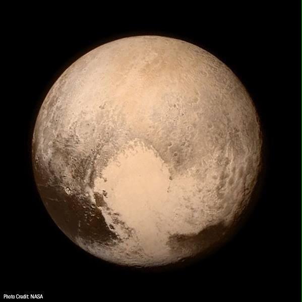 First picture of Pluto. It took the craft 9 years to get there. 3 billion miles away. Crazy stuff. RT #pluto