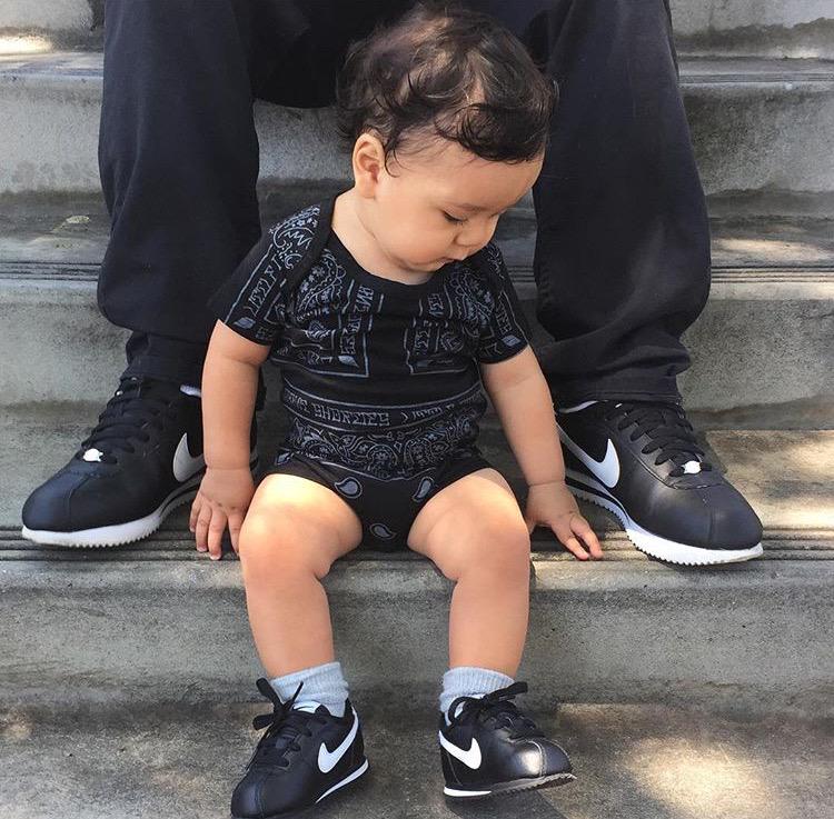 WeRLittleGiants's tweet photo. Doesn’t get any more OG then a pair of black Cortez &amp; a black paisley onesies from us! S/O @helllooojess on the 📷 http://t.co/BvMLgcgGCk