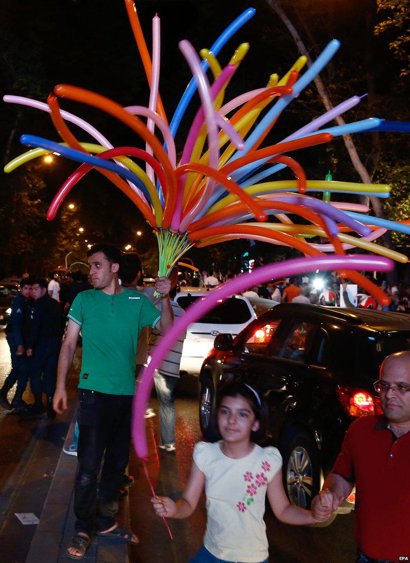 BBCWorld's tweet photo. Celebrations on Tehran's streets after #IranDeal reached http://t.co/lS12IVT4p8 http://t.co/Q4SVX50JPZ