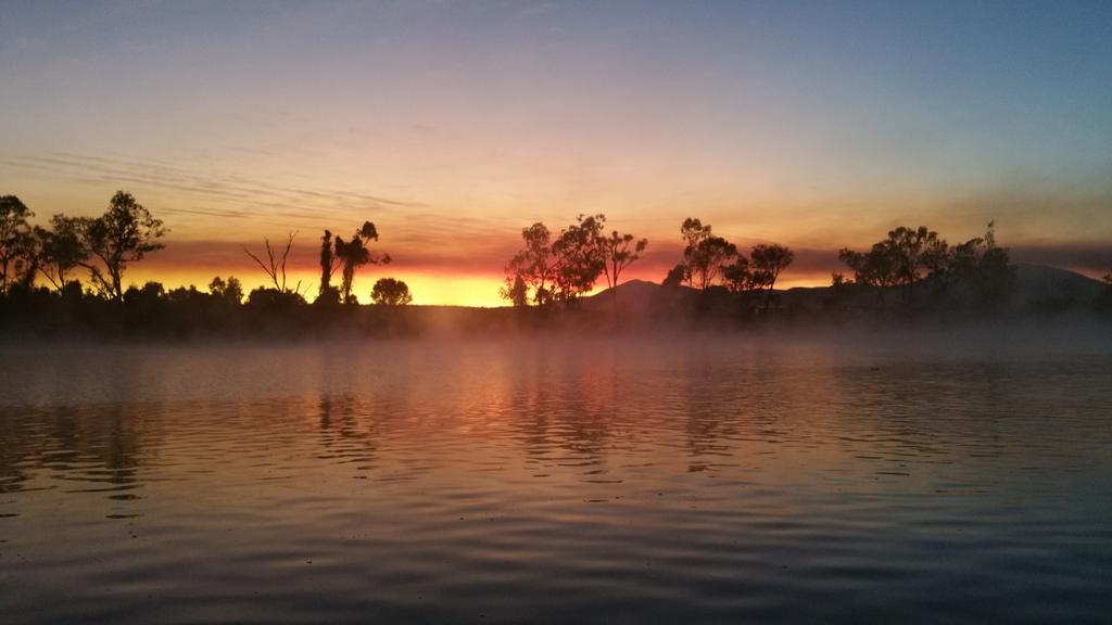 TCCSport's tweet photo. ROWING: a very cold morning on the Fitzroy River. @TCCRockhampton training hard despite the cool conditions. http://t.co/ybE9BxzJon