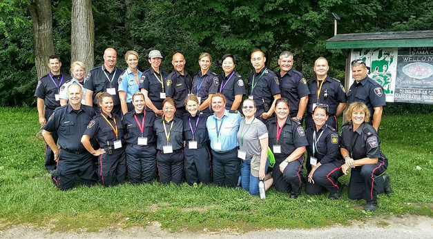 SafetyVillage_B's tweet photo. Great group of Police Officers giving time &amp; energy to train Safety Patrol Captains! Spot 4 @BrantfordPolice reps? http://t.co/aNAxs5gJZQ