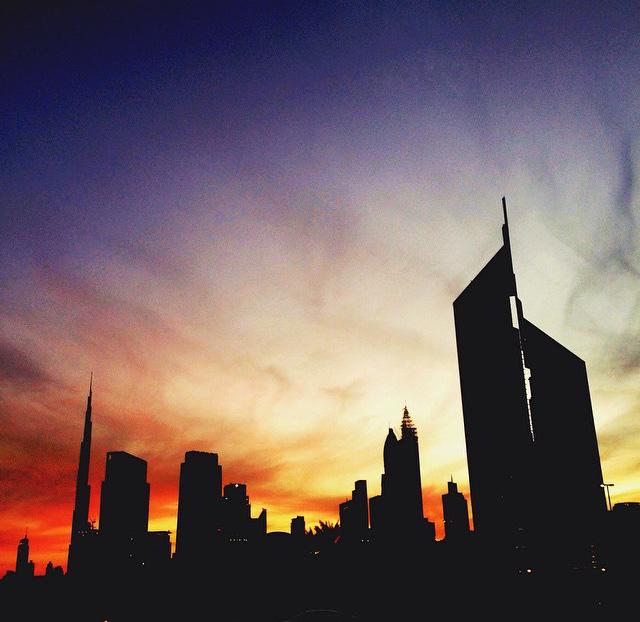 mychoiceon's tweet photo. TBT to a winter sky in Dubai! A great silhouette image of the skyline. http://t.co/pjAmkWyO02