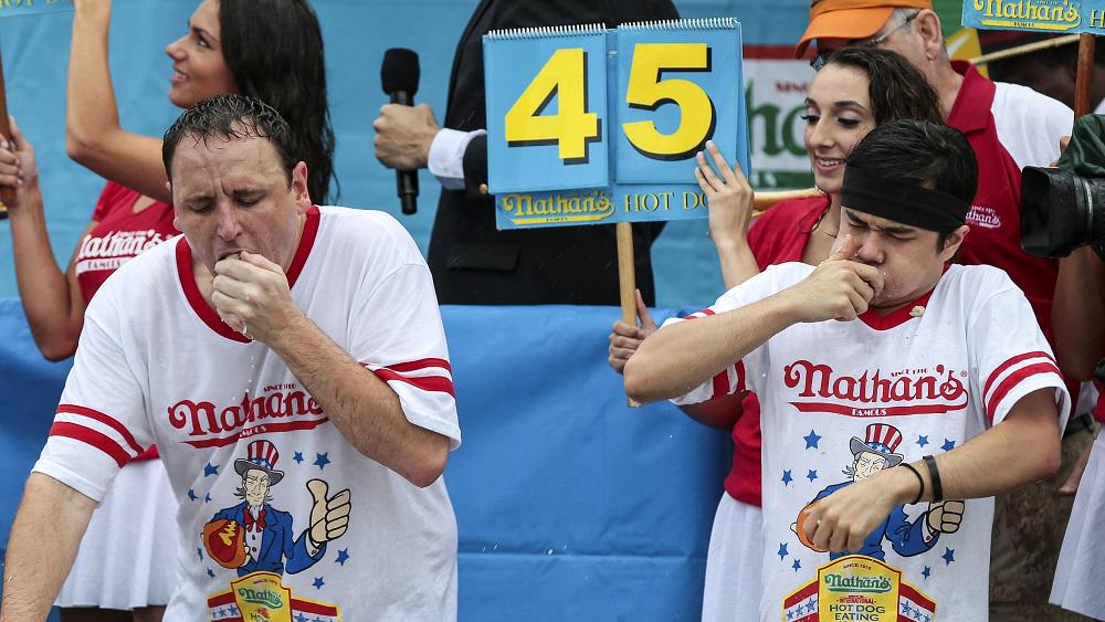 ESPNInsights's tweet photo. 62 hot dogs down. Matt Stonie upsets Joey Chestnut in the Hot Dog Eating Contest!

Chestnut's streak comes to an end http://t.co/m4U3mzoYVk