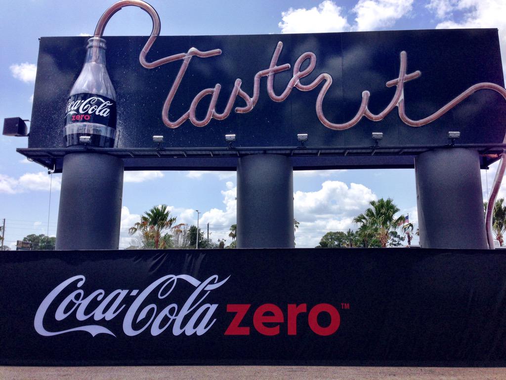 NASCARonUSA's tweet photo. It's hot here! Fans here for the #CokeZero400 weekend can cool down at the @CokeZero drinkable billboard. #OpenToTry http://t.co/JSaLY0DABI
